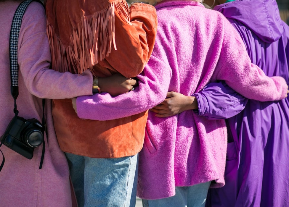 A person holding a baby.